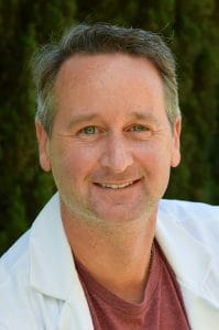 Portrait of Damon Raskin, M.D.,